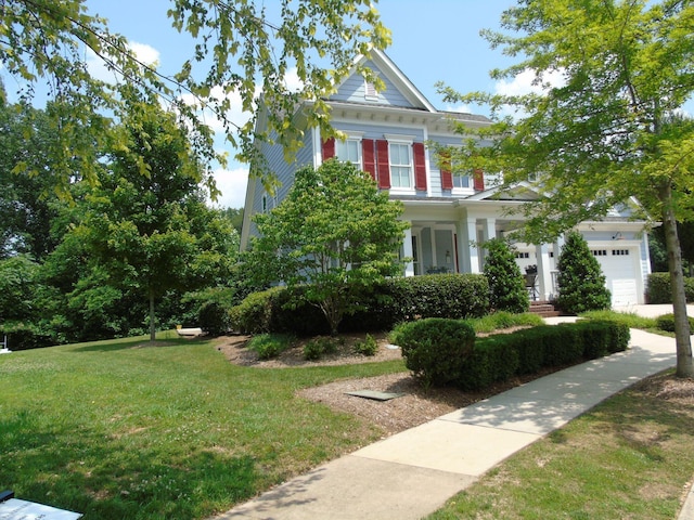807 Blissfield Ct, Chattanooga, TN 37419 - greek revival house with a front lawn, an attached garage, and a porch