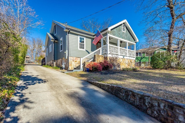 view of front of home featuring covered porch and ceiling fan