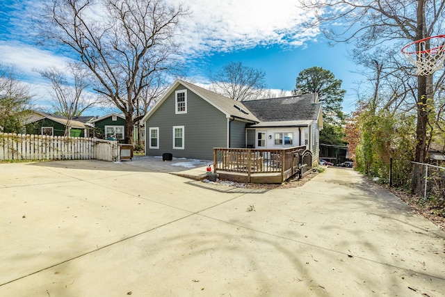 rear view of house with a deck