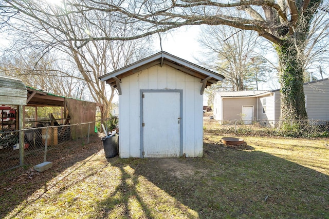 view of outdoor structure featuring a yard