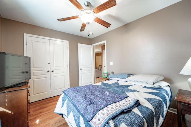 bedroom featuring a closet, ceiling fan, and light hardwood / wood-style floors