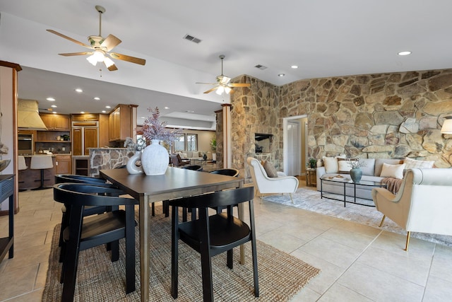 dining area with light tile patterned floors and ceiling fan