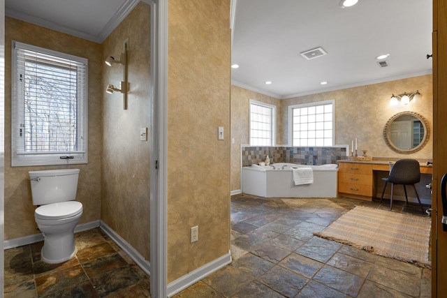 bathroom featuring ornamental molding, toilet, a bathing tub, and vanity