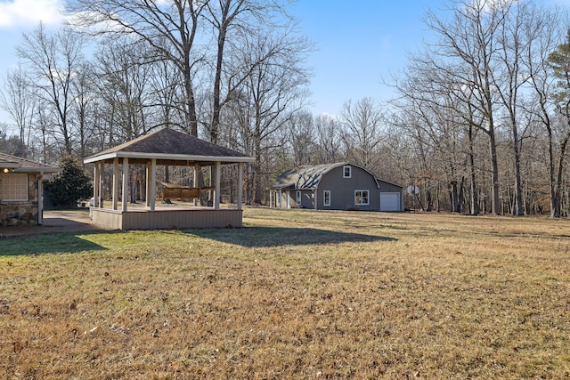 view of yard with a gazebo and a garage