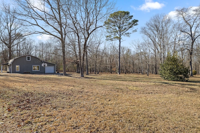 view of yard featuring a garage