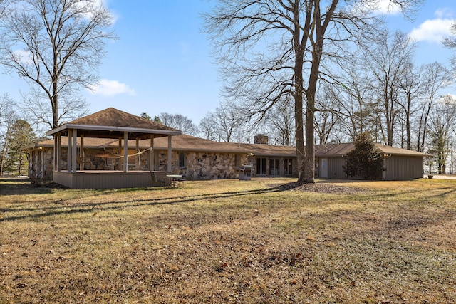 exterior space featuring a lawn