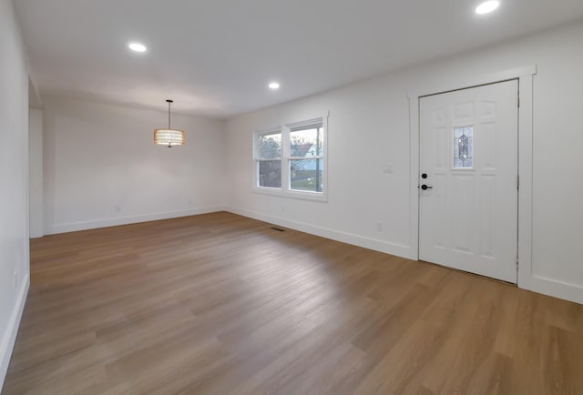 foyer with light wood-type flooring