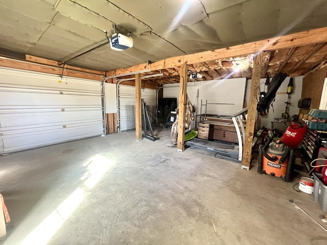 garage featuring a garage door opener