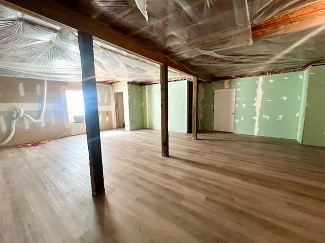 basement with wood-type flooring