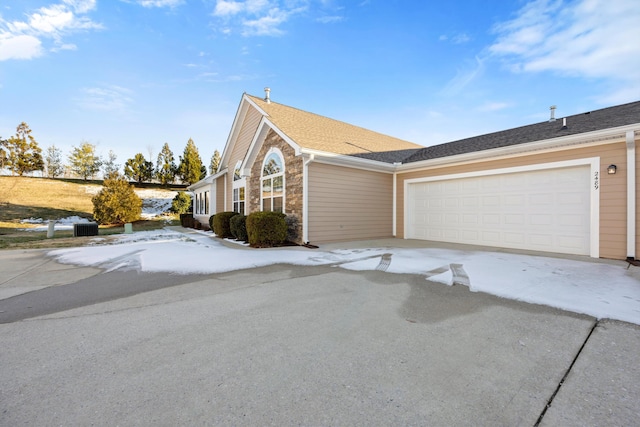 view of home's exterior with a garage