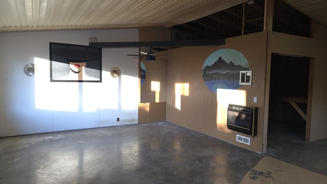 garage with ceiling fan and heating unit