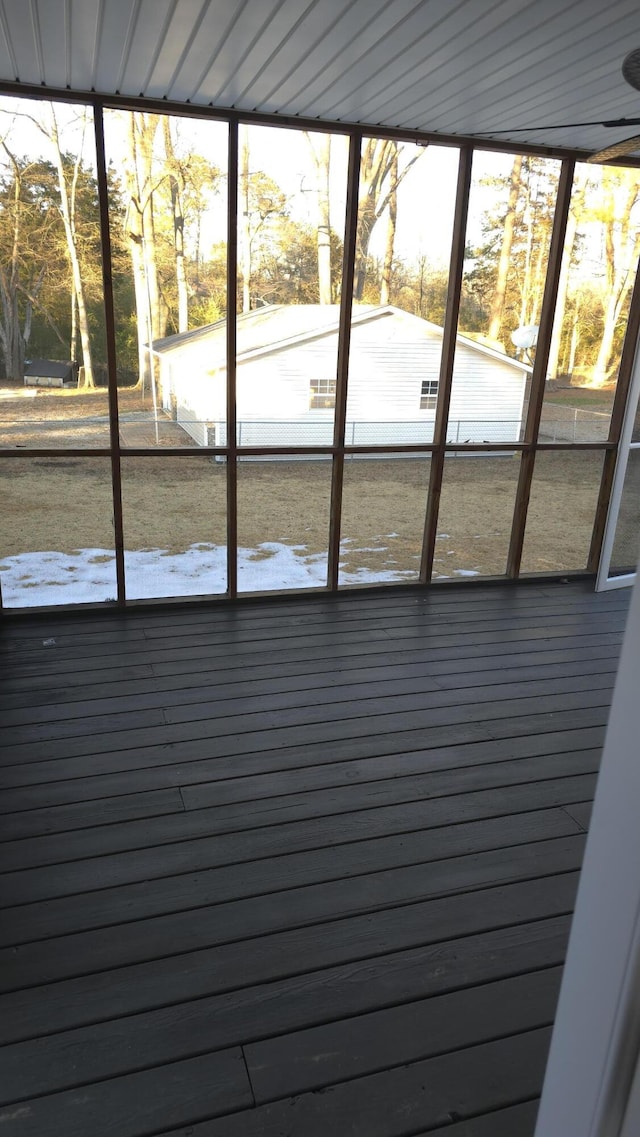 unfurnished sunroom with a healthy amount of sunlight