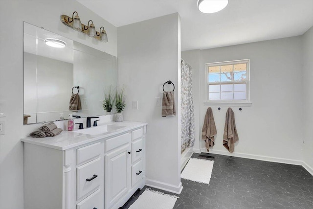 bathroom with vanity and curtained shower