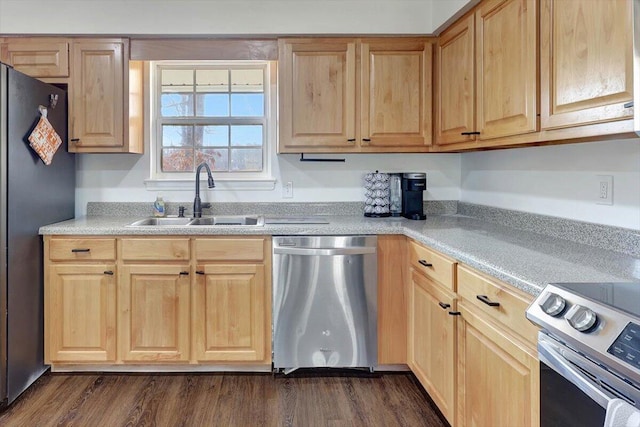 kitchen featuring sink, dark wood-type flooring, light brown cabinets, and appliances with stainless steel finishes