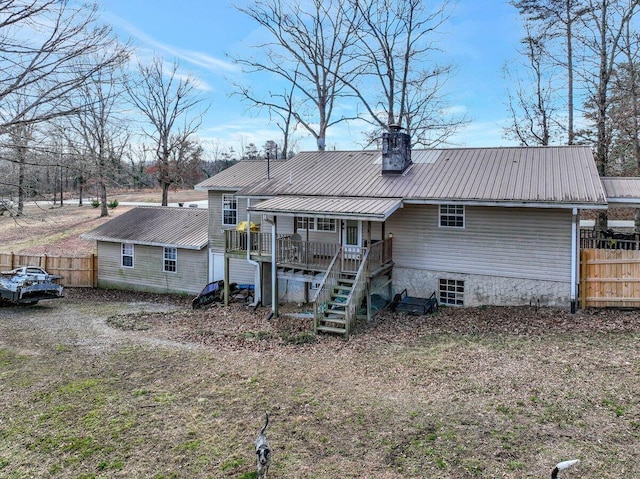 back of house with covered porch