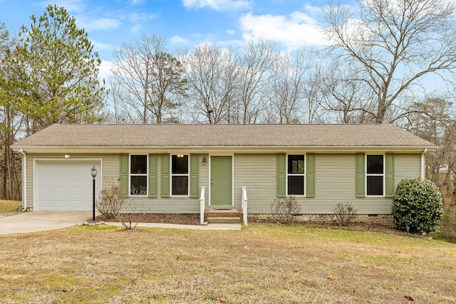 ranch-style home with a front yard and a garage