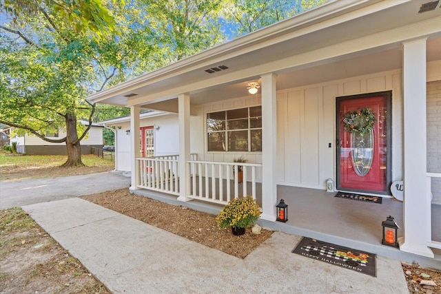 property entrance with covered porch