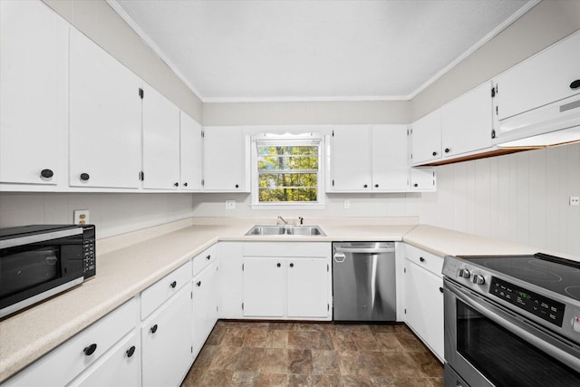 kitchen with crown molding, white cabinetry, sink, and stainless steel appliances