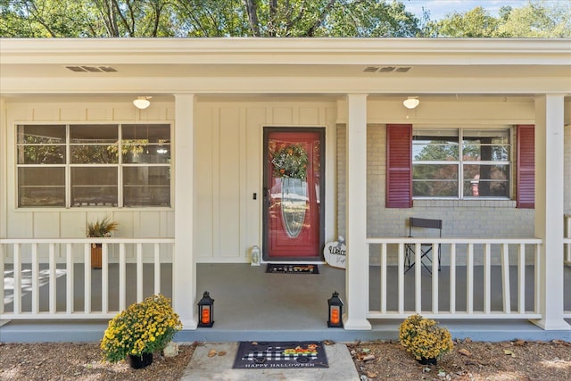 doorway to property with covered porch