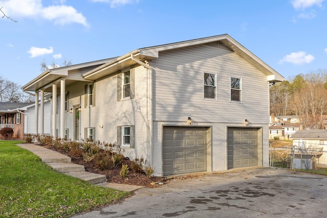 view of home's exterior with a garage