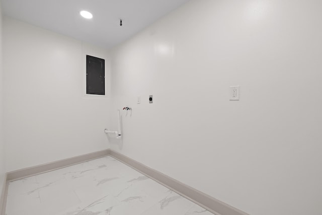 washroom with electric dryer hookup, hookup for a washing machine, and electric panel