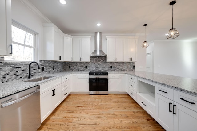 kitchen with electric range oven, white cabinets, dishwasher, wall chimney exhaust hood, and sink