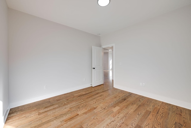 unfurnished room featuring light wood-type flooring