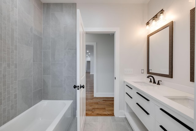 bathroom featuring tile patterned floors and vanity