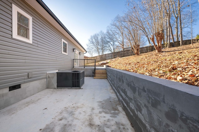 view of patio with central AC