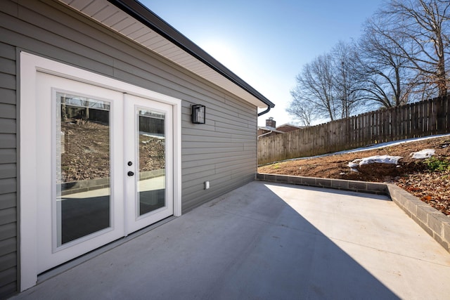 view of patio featuring french doors