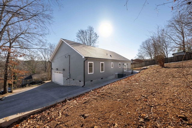 view of home's exterior featuring a garage