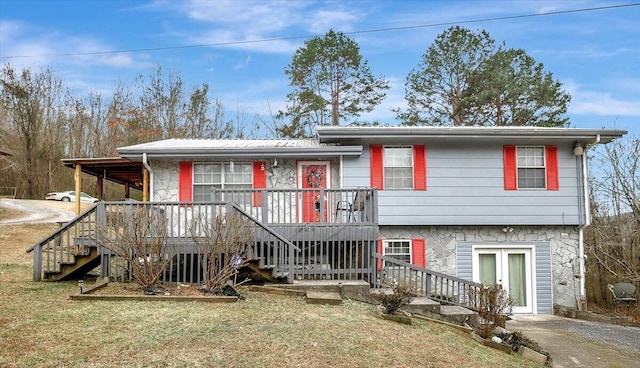 view of front of home with french doors and a front yard