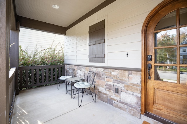 view of patio featuring covered porch