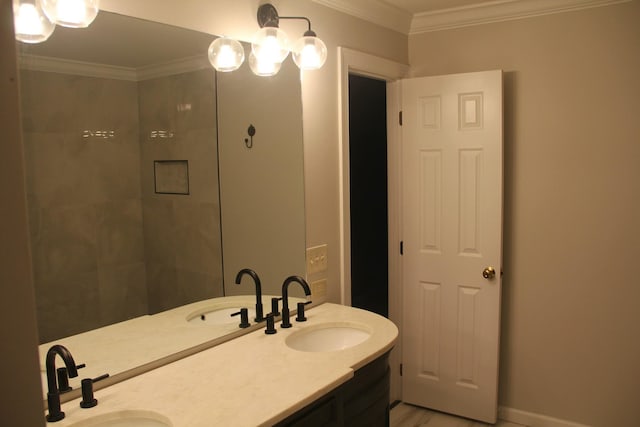 bathroom with vanity and crown molding