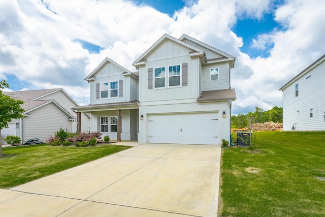 craftsman house featuring a front lawn and a garage