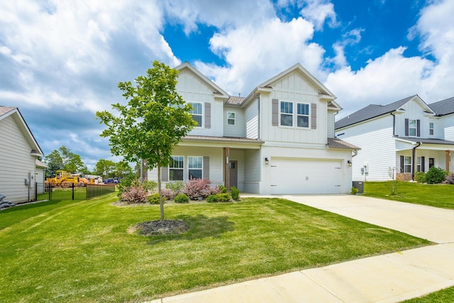 craftsman-style house featuring a garage and a front lawn