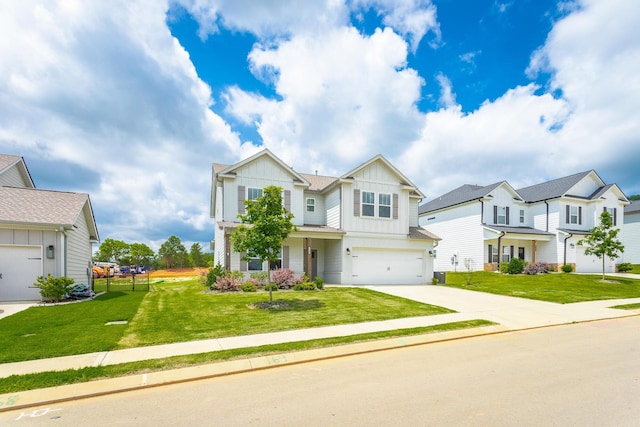 view of front of house featuring a front lawn and a garage