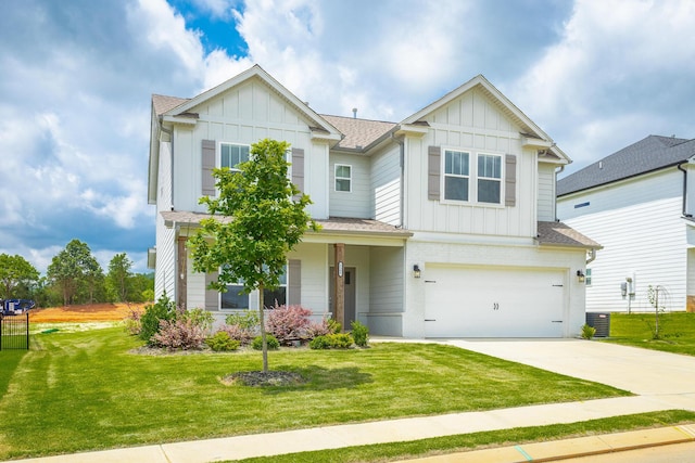 craftsman house with a front yard, a garage, and central air condition unit