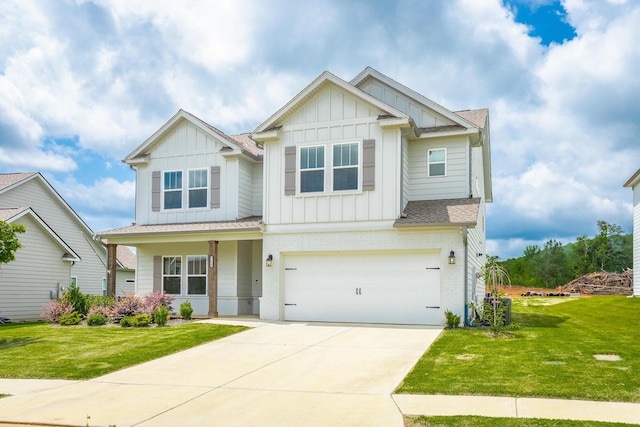 craftsman-style house featuring a front yard and a garage