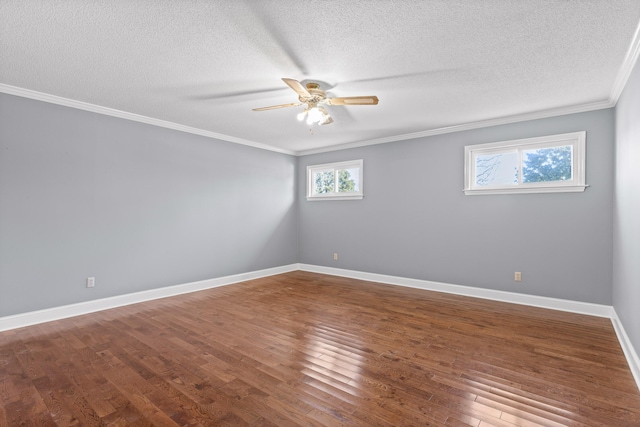 empty room with ceiling fan, crown molding, a textured ceiling, and hardwood / wood-style flooring