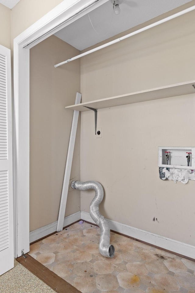 clothes washing area with hookup for an electric dryer