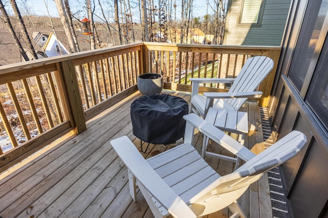 wooden terrace with grilling area