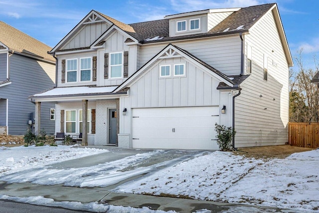 view of front of home with a garage and covered porch