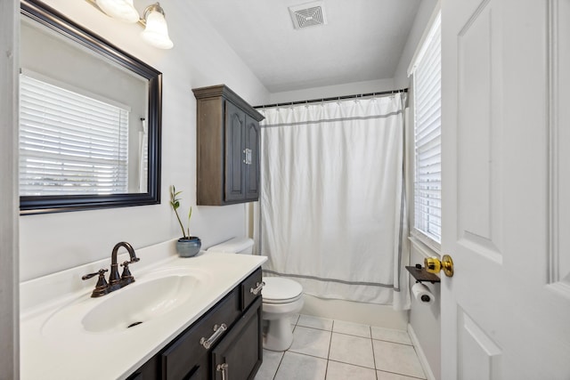 full bathroom featuring shower / bathtub combination with curtain, tile patterned flooring, vanity, and toilet