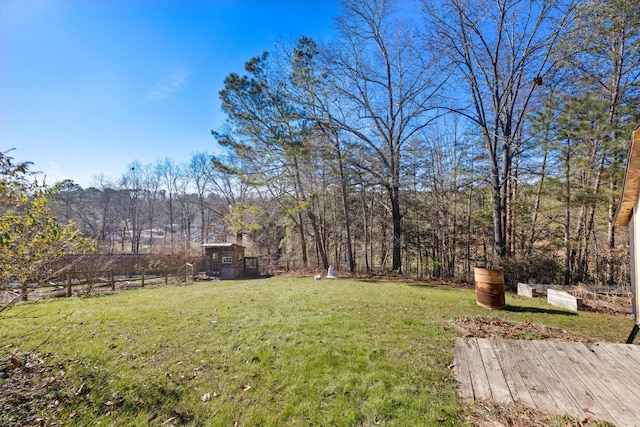 view of yard featuring a wooden deck