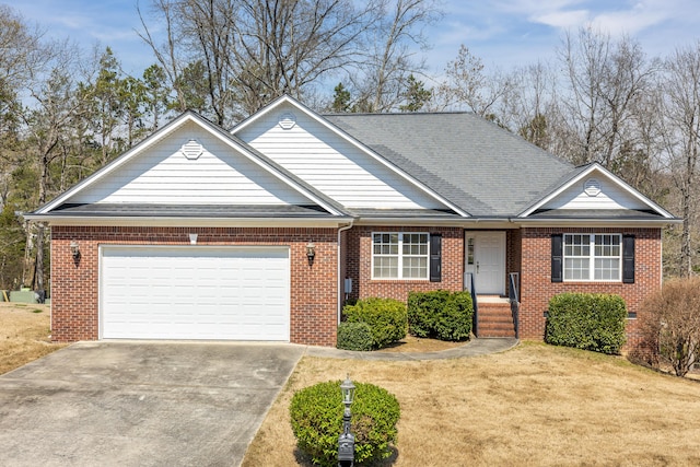 ranch-style home with a front yard and a garage