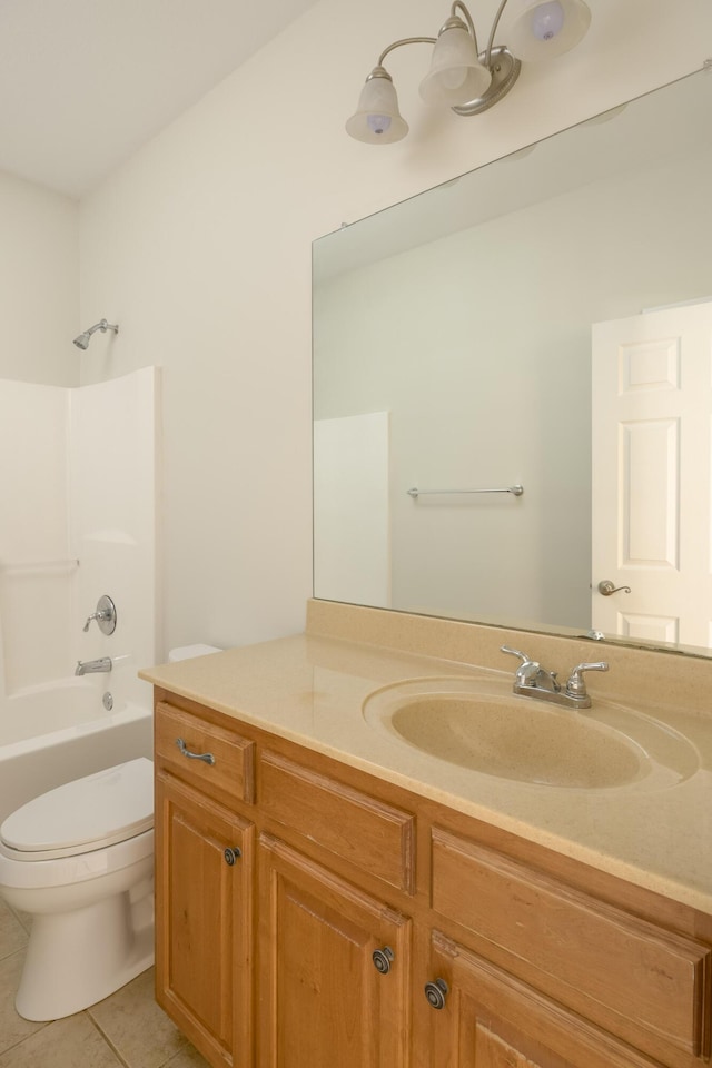 full bathroom featuring toilet, tile patterned floors, shower / washtub combination, and vanity