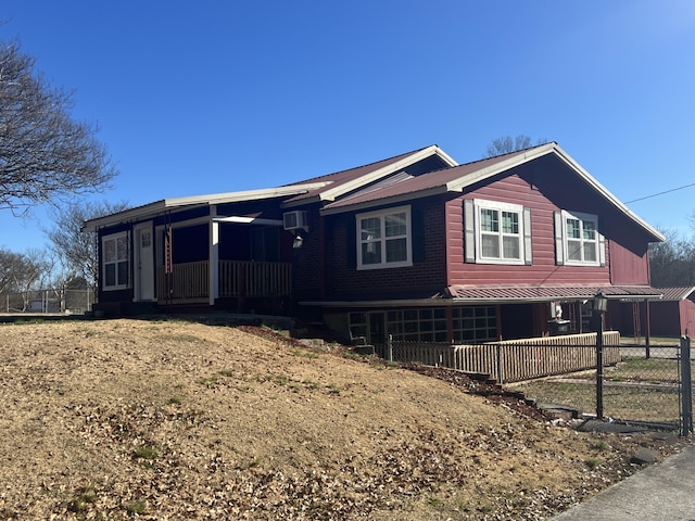 view of property exterior with a porch