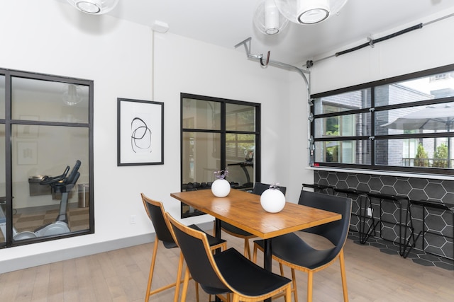 dining room with light hardwood / wood-style floors