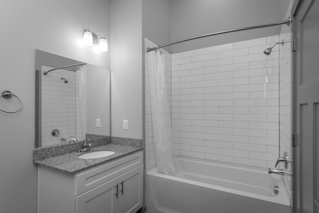 bathroom with vanity and shower / tub combo